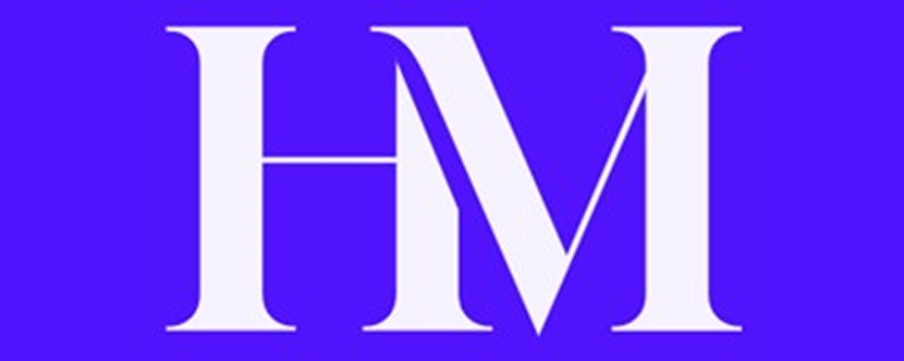 Close-up of a bold white letter 'M' on a vibrant blue background.