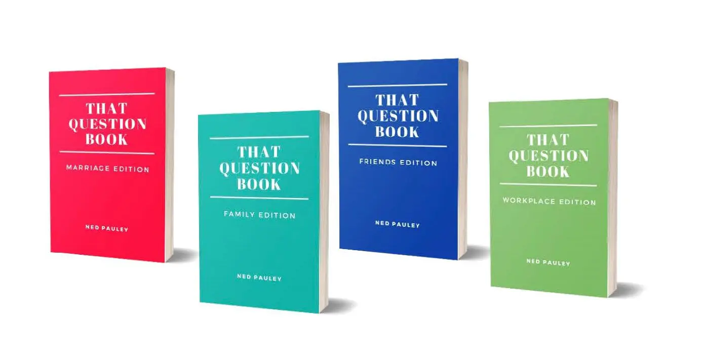 Three colorful books titled 'That Question Book' in teal, blue, and green covers.